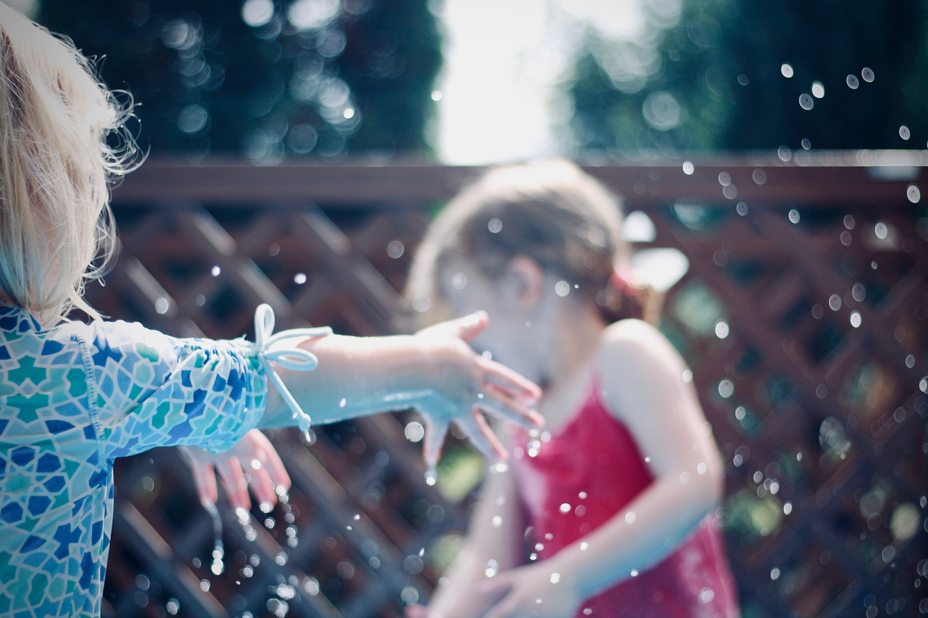 Alice loved playing with the other children at the pool. | Source: Unsplash