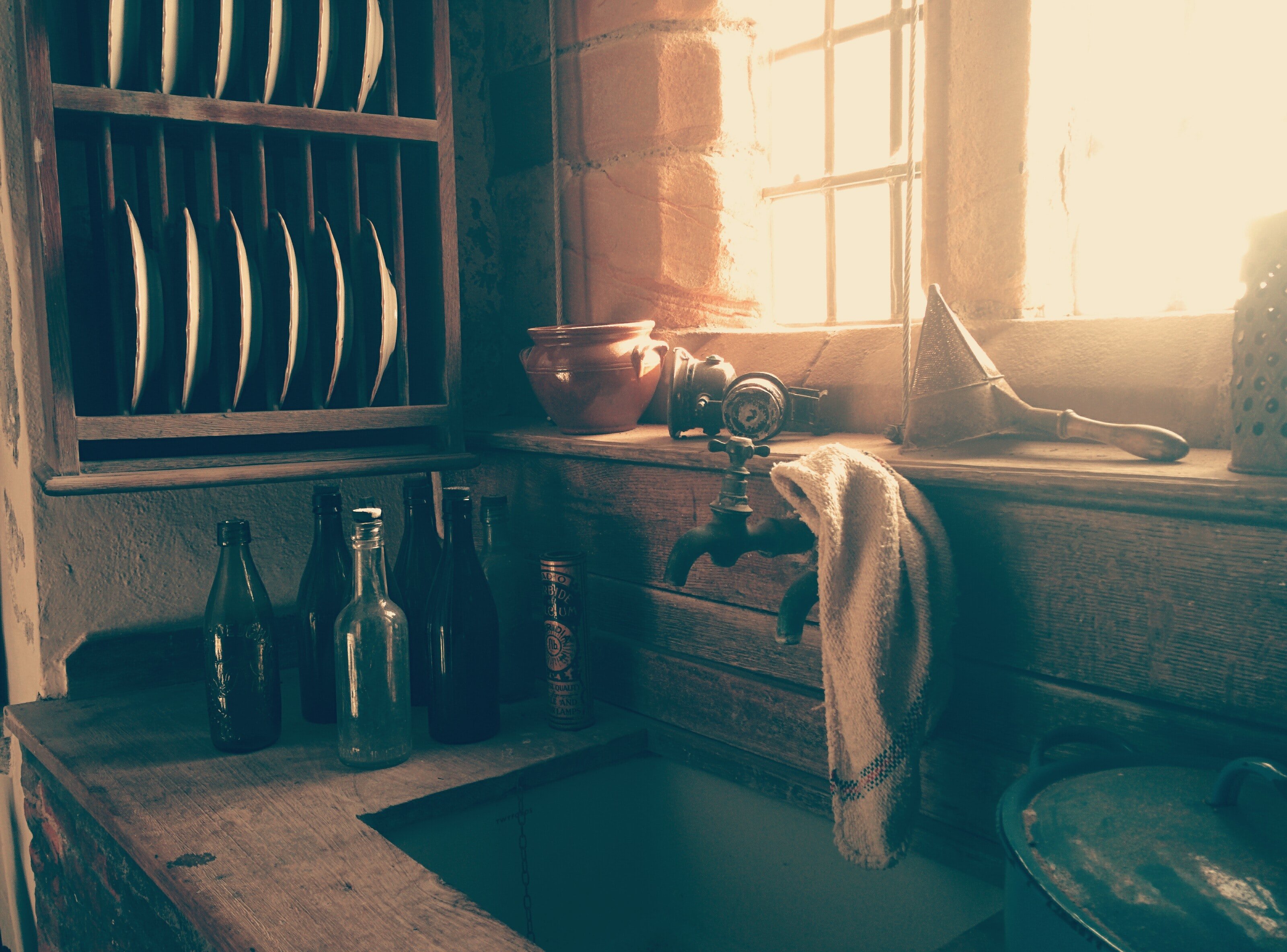 There was a huddled figure on the floor of the old kitchen. | Source: Unsplash
