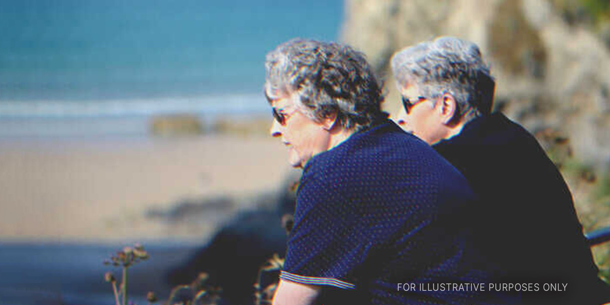 Twins Sister Gazing At Sea. | Source: Shutterstock