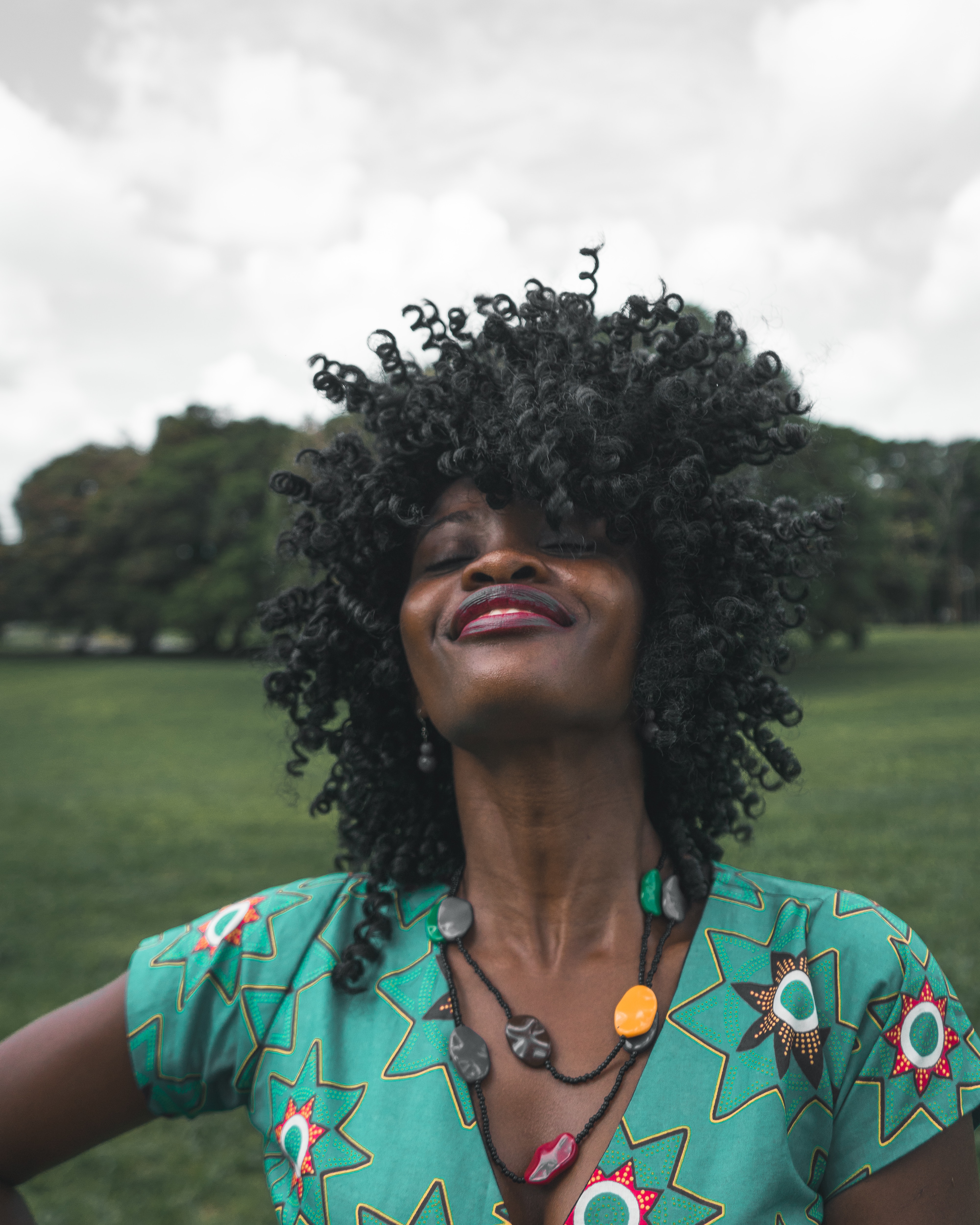 A woman smiling. | Source: Unsplash