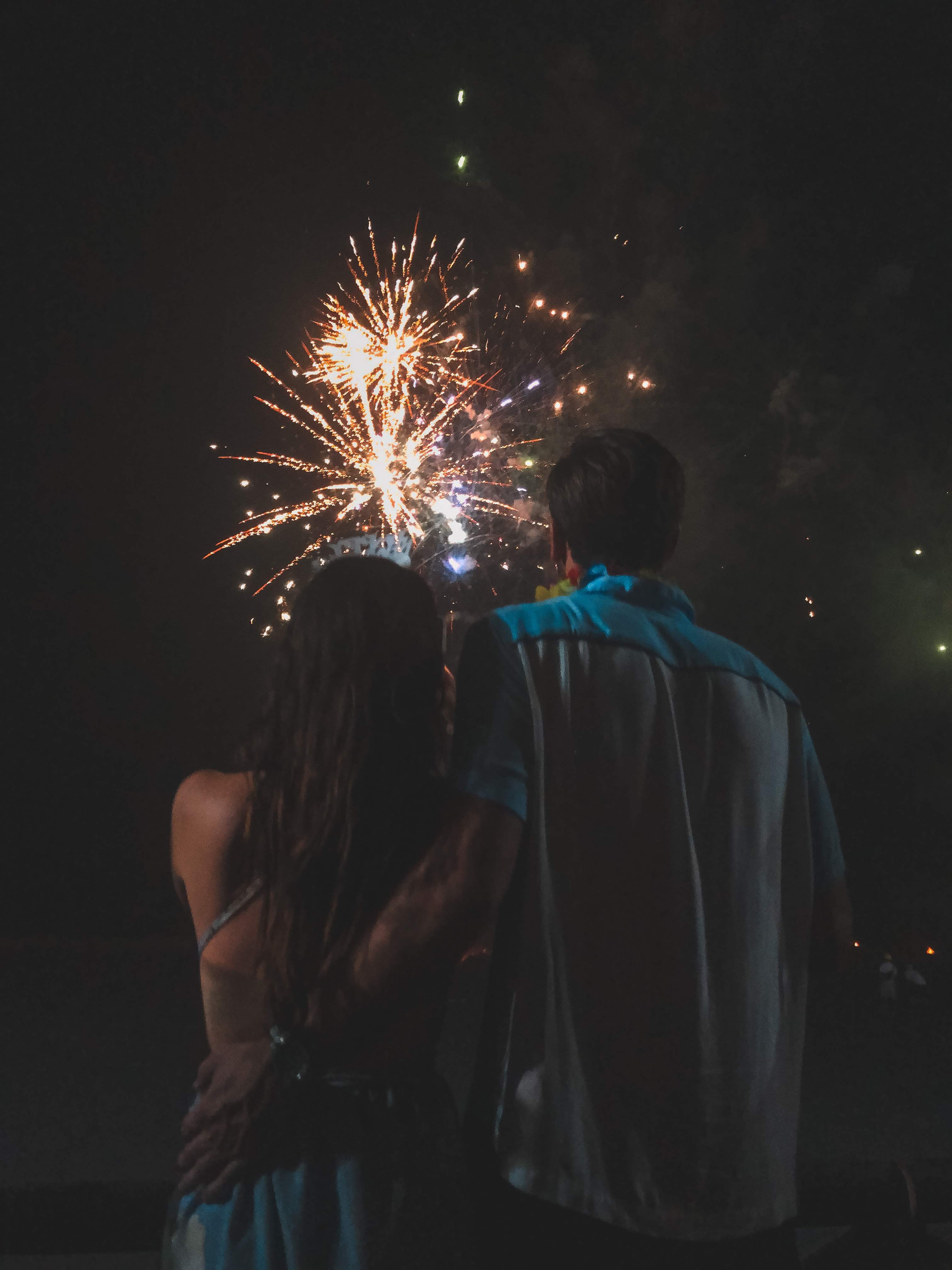 A couple looking at fireworks. | Source: Unsplash