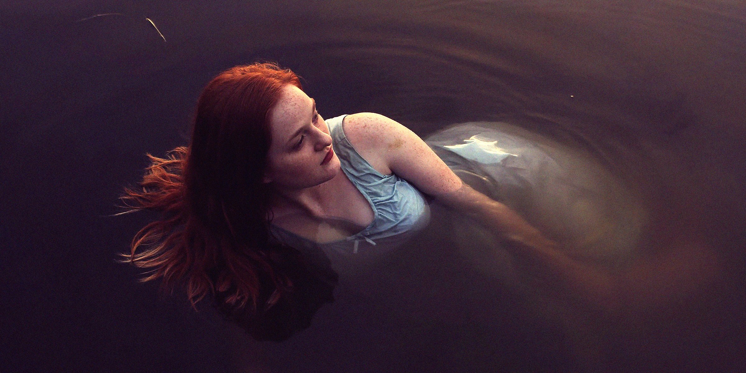 Unsplash  | A woman swimming