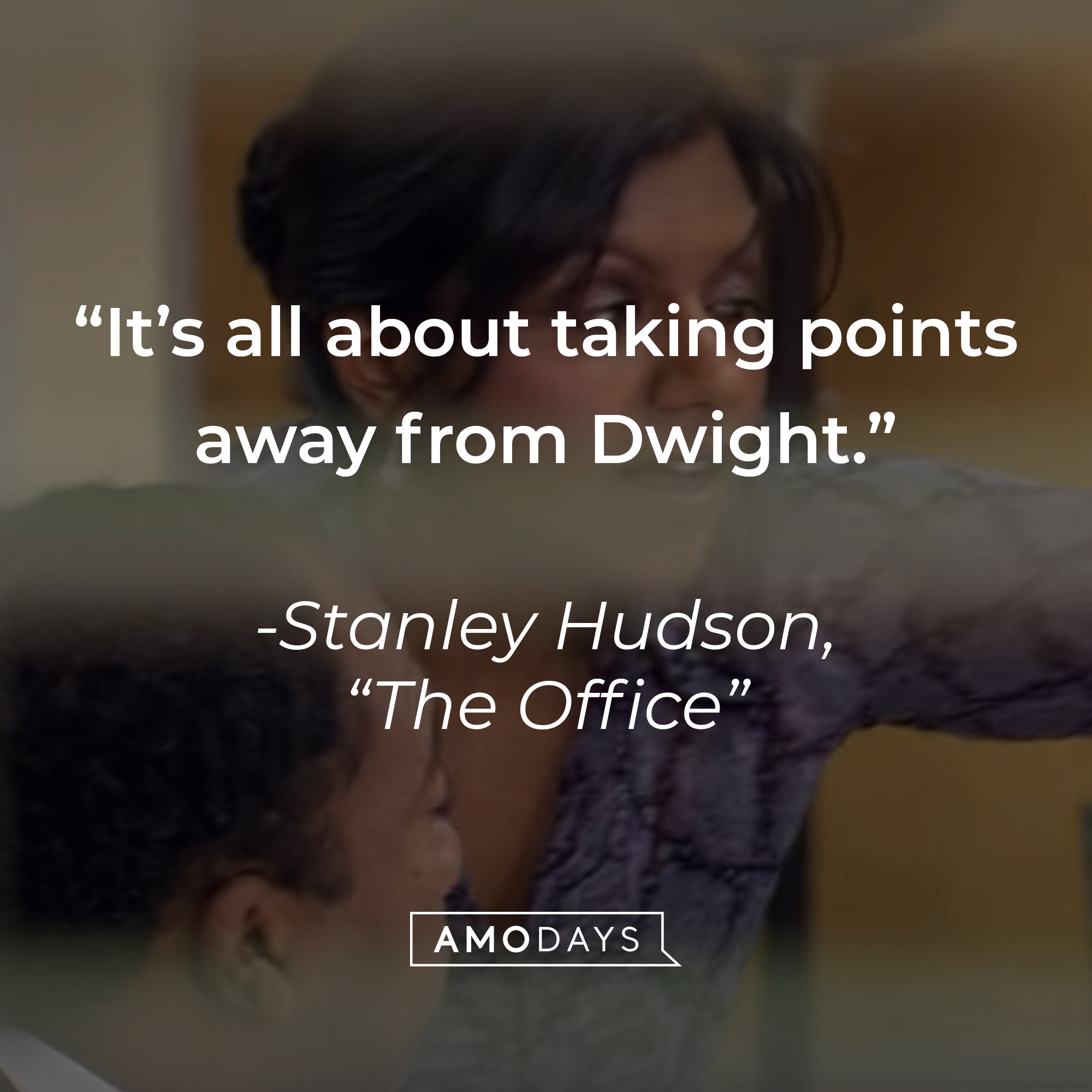 An image of Leslie David Baker as Stanley Hudson in "The Office" with the quote: "It’s all about taking points away from Dwight." | Source: youtube.com/The Office