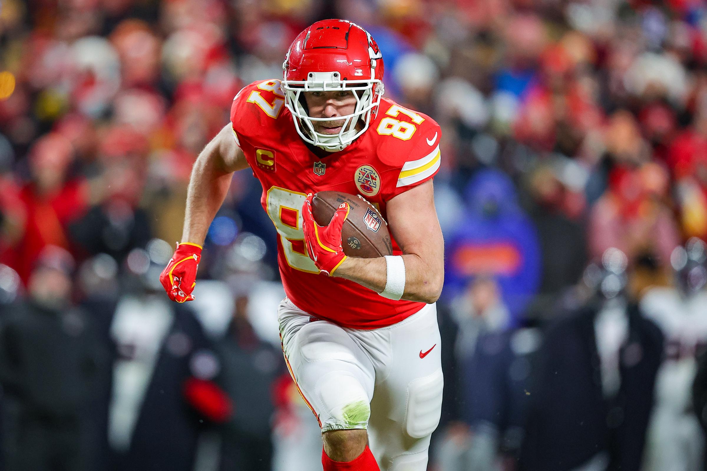 Travis Kelce #87 of the Kansas City Chiefs runs for yardage after a third quarter pass catch in the Divisional Round playoff on January 18, 2025, in Kansas City, Missouri | Source: Getty Images