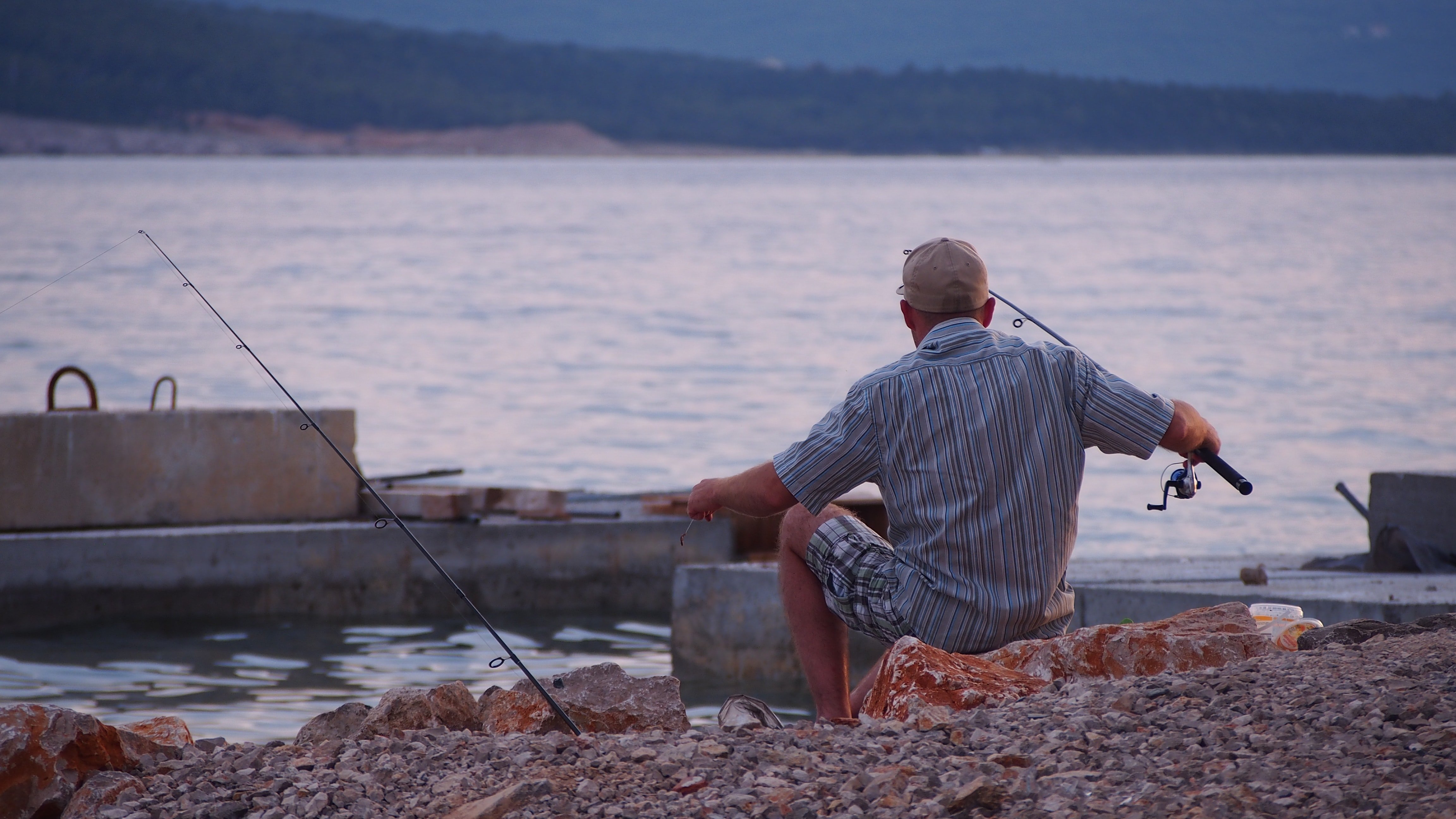 Every Wednesday, Kevin went to a lake in the woods & fished the whole day. | Source: Unsplash