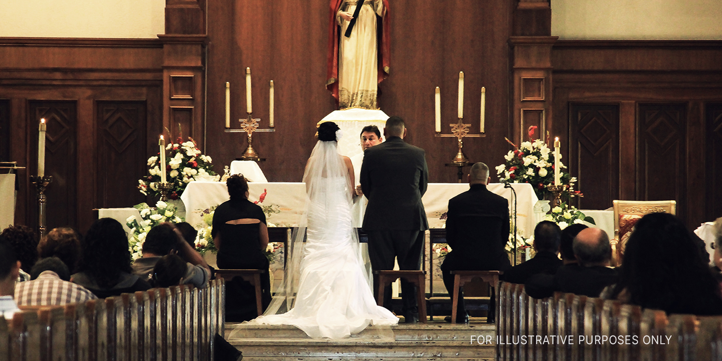 Bride and groom standing in a church | Source: Flickr/demxx (CC BY 2.0)