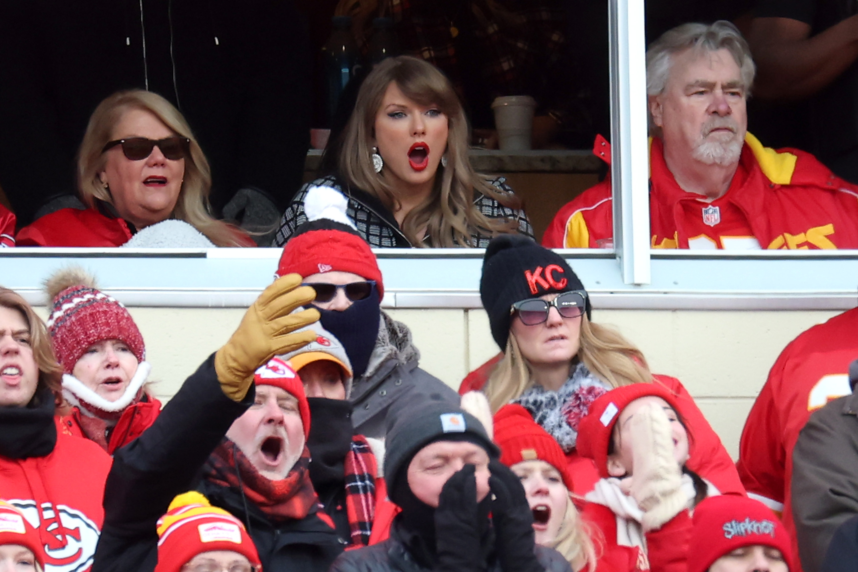 Singer-songwriter Taylor Swift, her mother Andrea Swift, and her father Scott Kingsley Swift are seen watching the AFC Divisional Playoff between the Houston Texans and the Kansas City Chiefs on January 18, 2025, in Kansas City, Missouri | Source: Getty Images