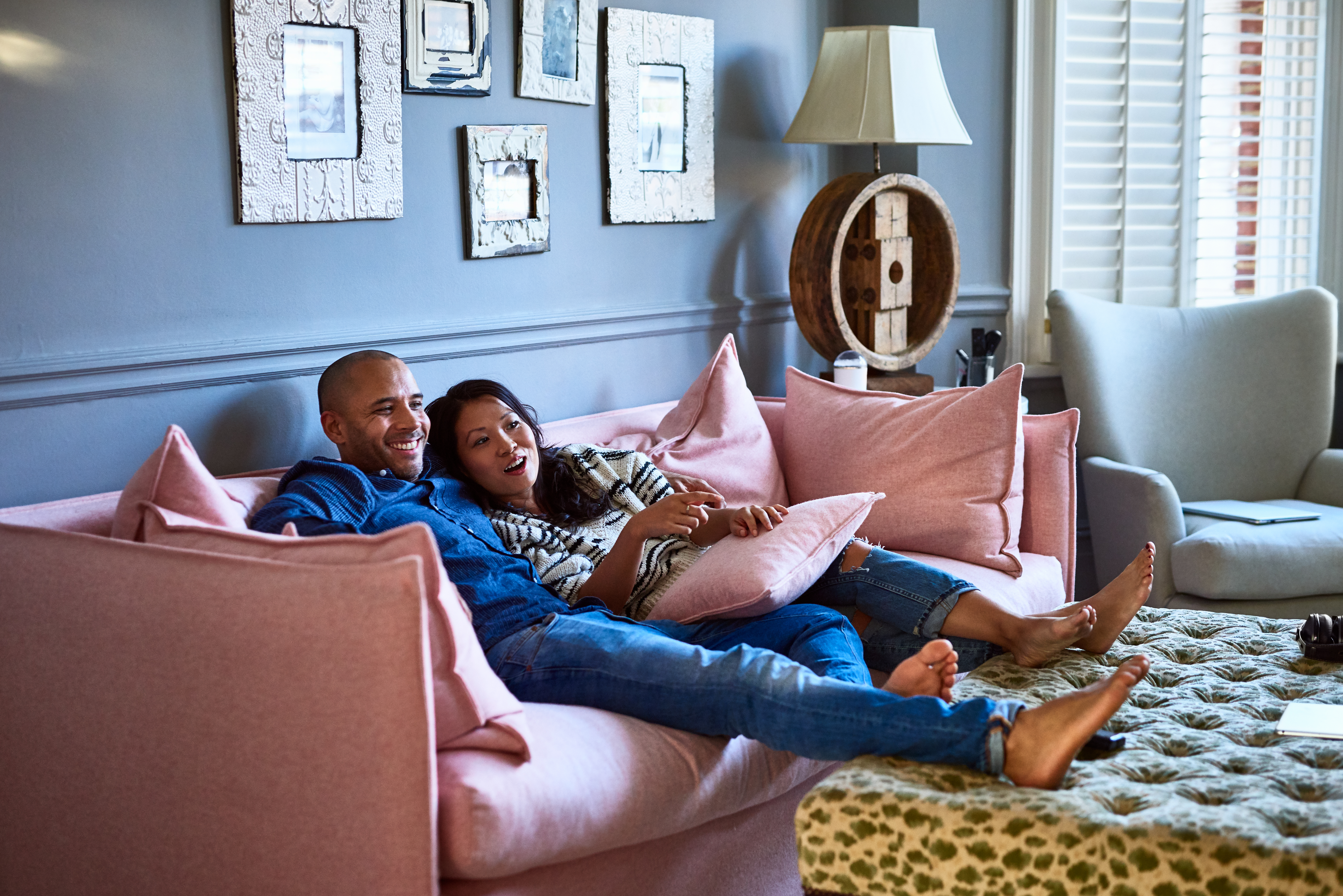 A couple relaxing at homw. | Source: Getty Images