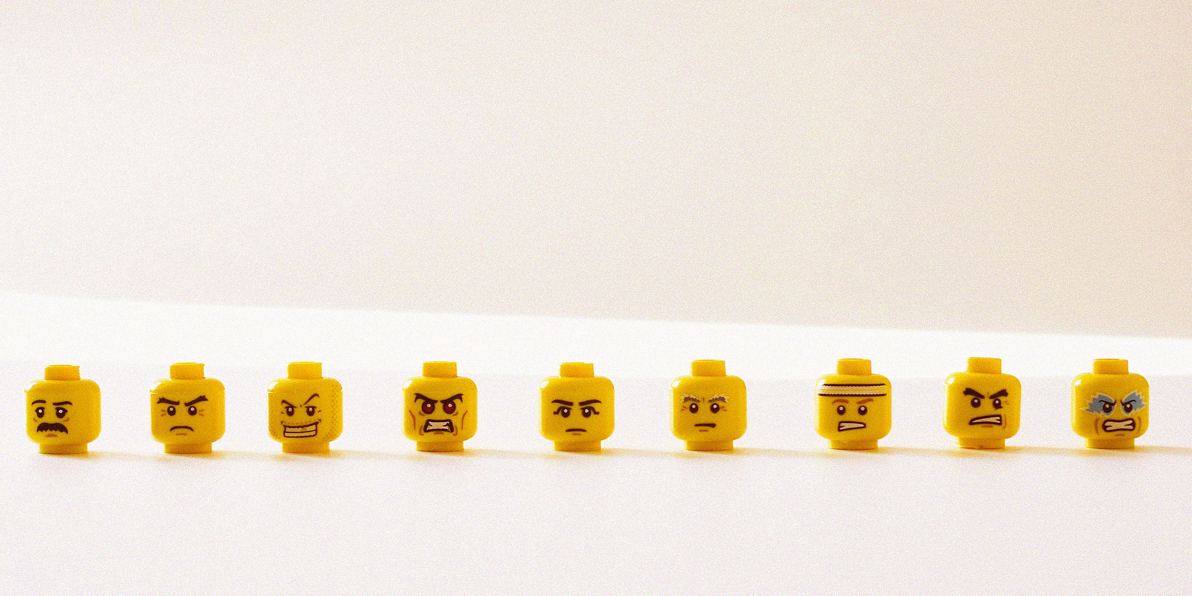 Unsplash | A line of lego faces with different facial expressions