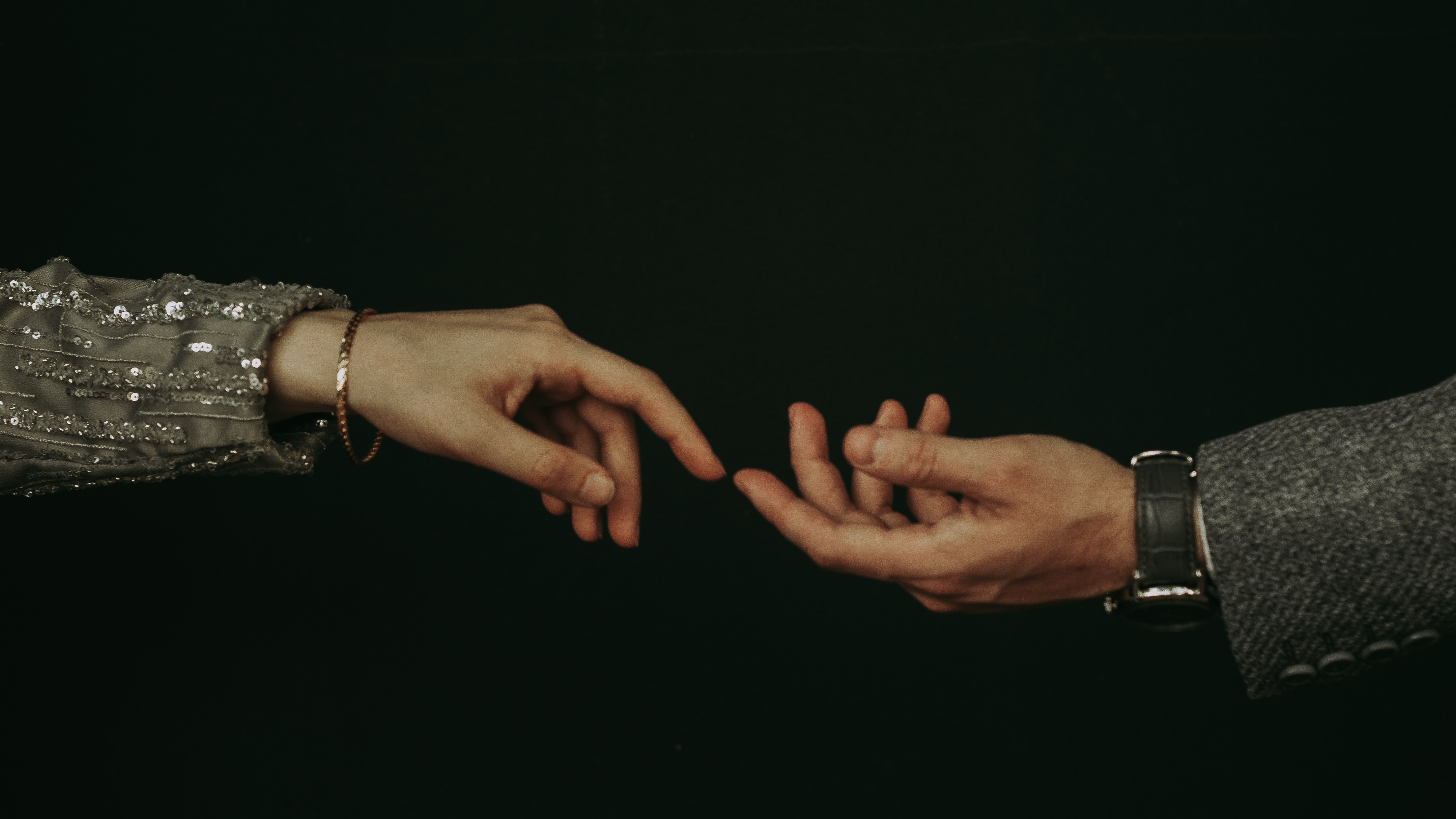 Hands Of A Romantic Couple. | Source: Pexels