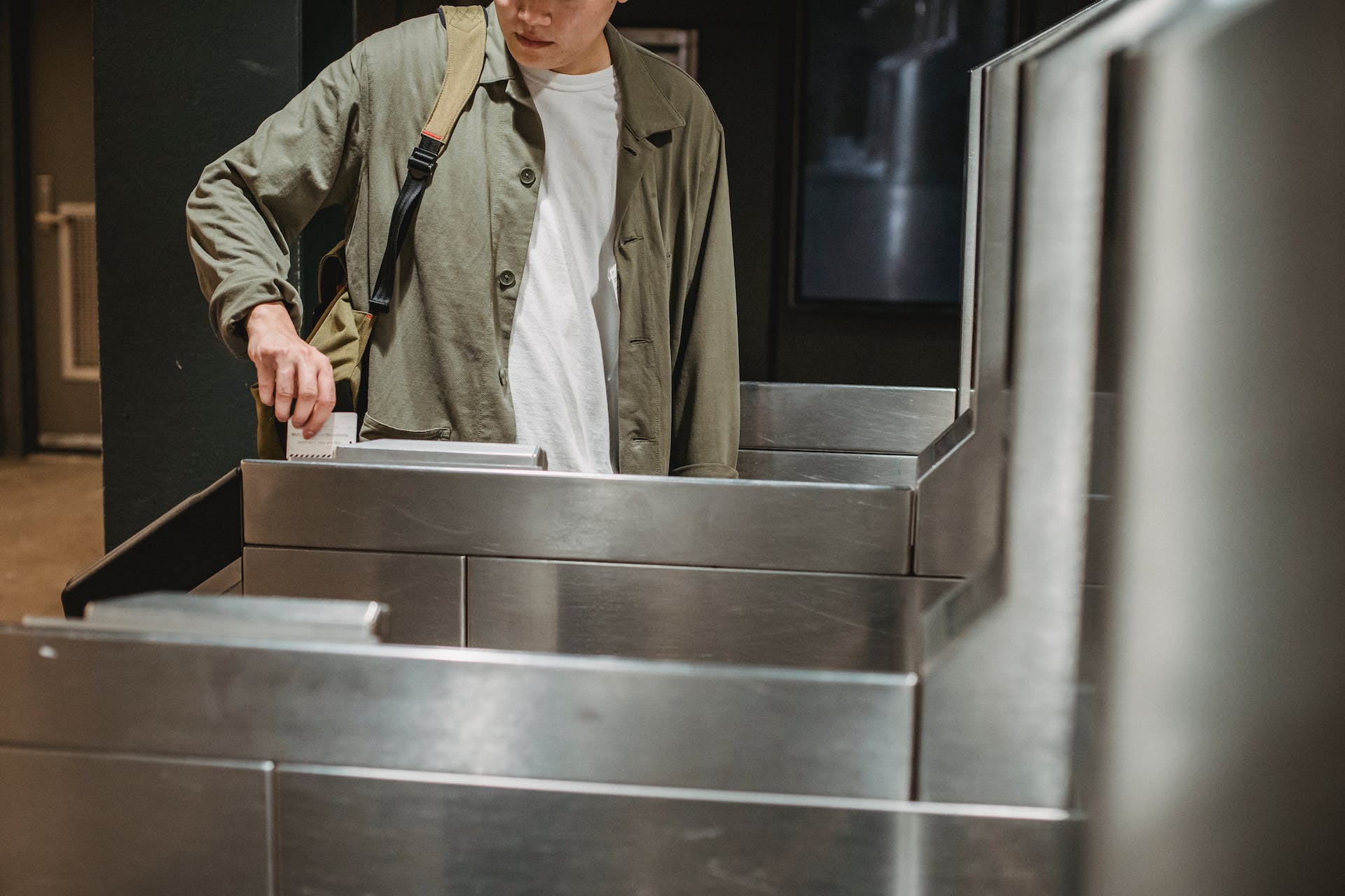 A man using his public transport card | Source: Pexels