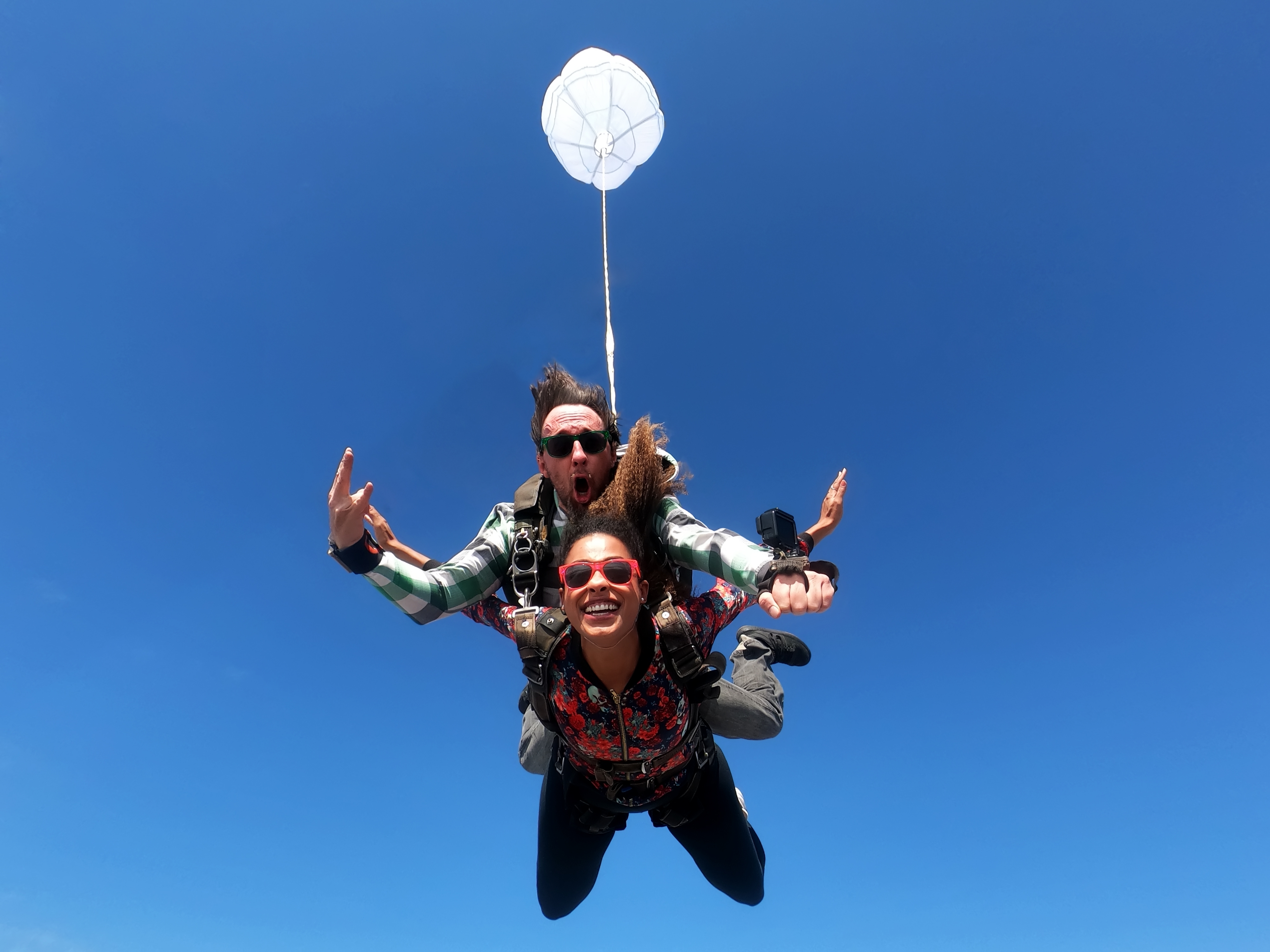 Skydiving couple. | Source: Shutterstock