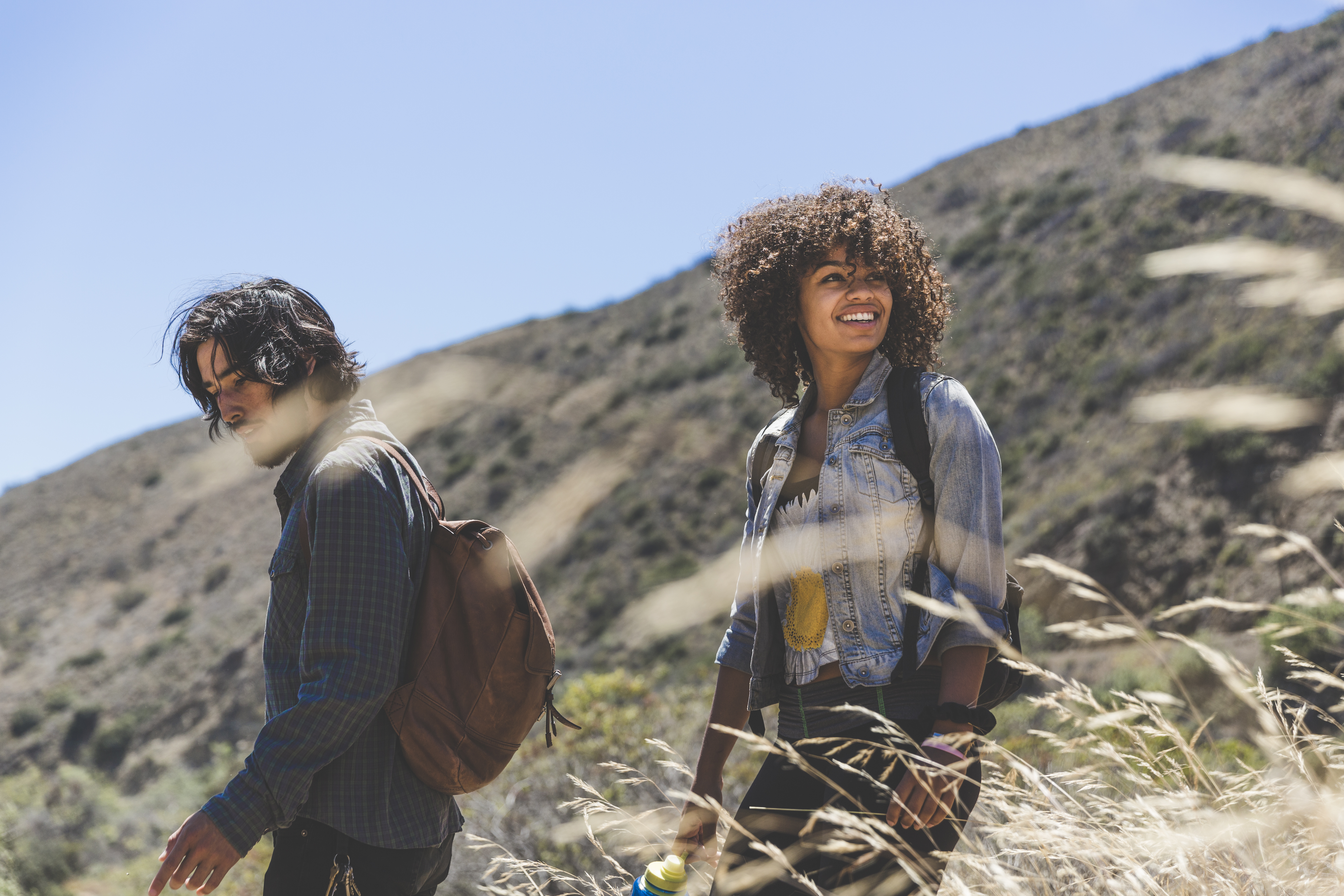 Couple hiking in the mountains. | Source Getty Images