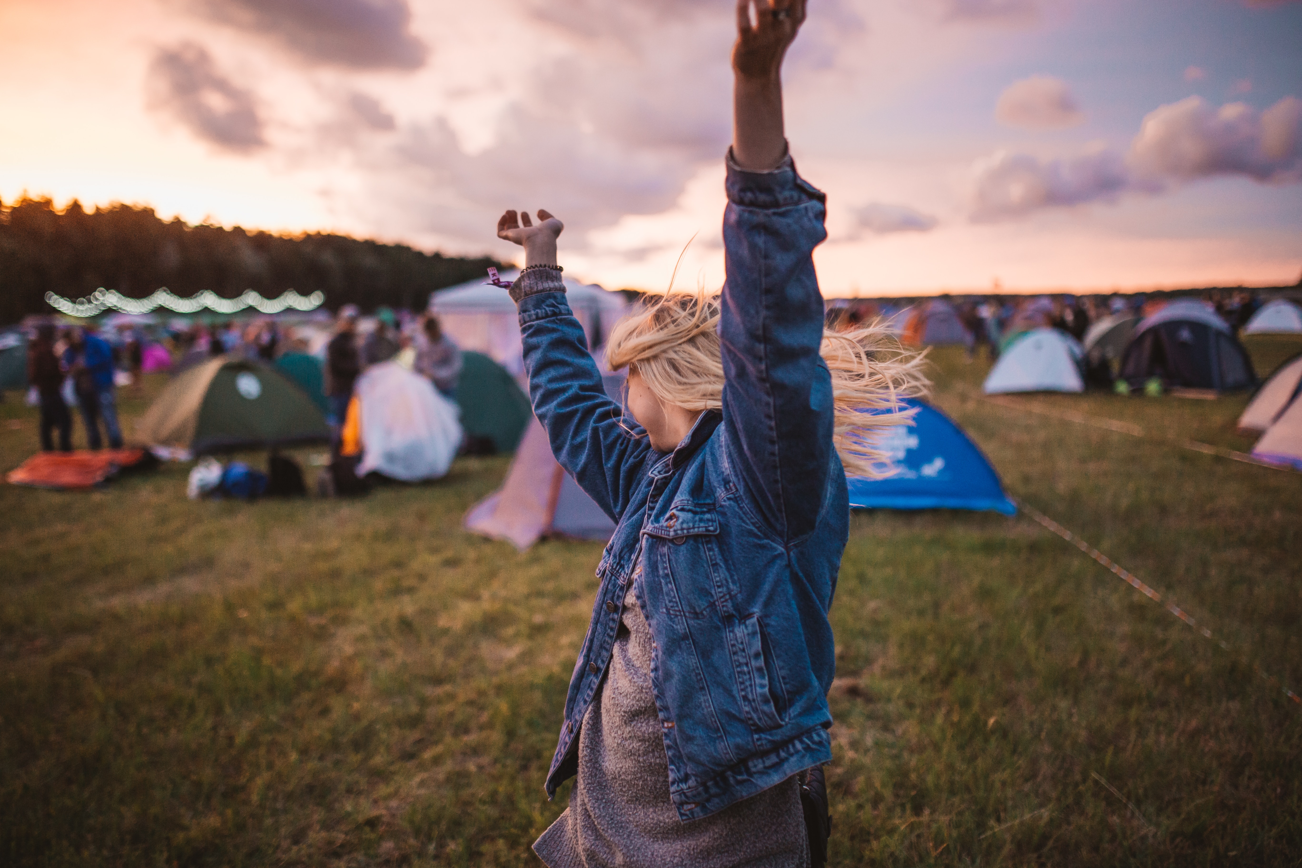 A woman dancing at a festival. | Source: Unsplash