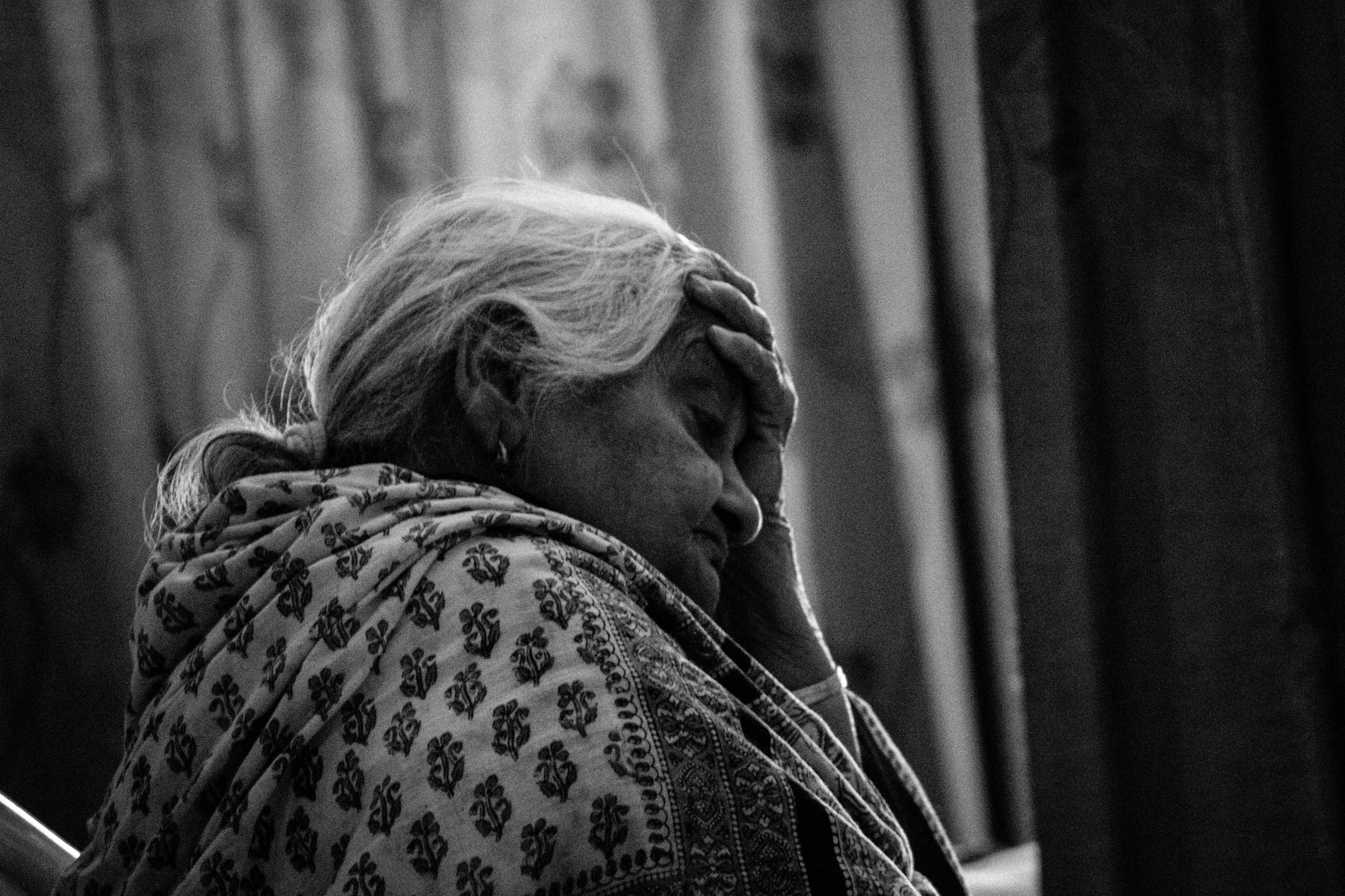 James found an old woman weeping in the corner of a room. | Source: Pexels