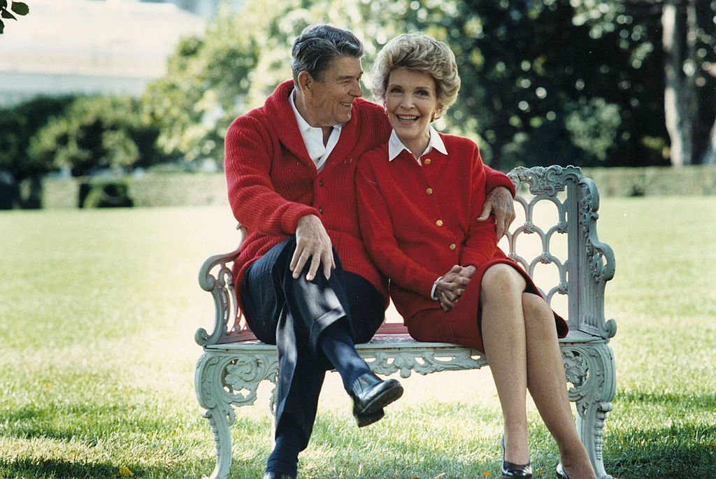 Former U.S. President Ronald Reagan and First Lady Nancy Reagan share a moment in this undated file photo. | Source: Getty Images