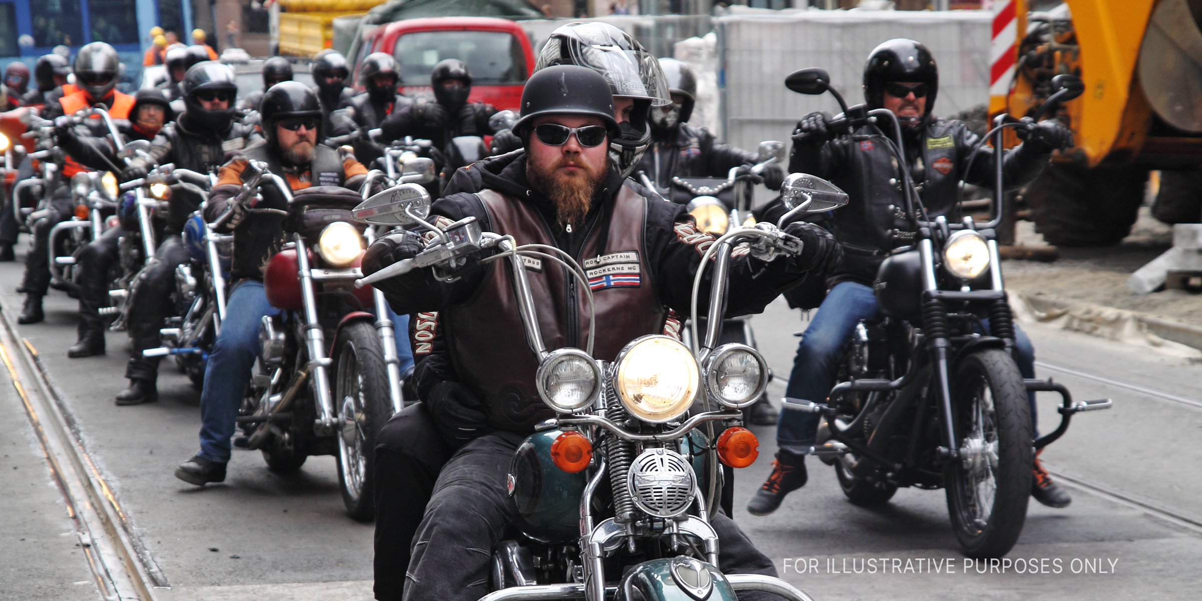 Group of men in motorcycles on the road. | Source: Shutterstock