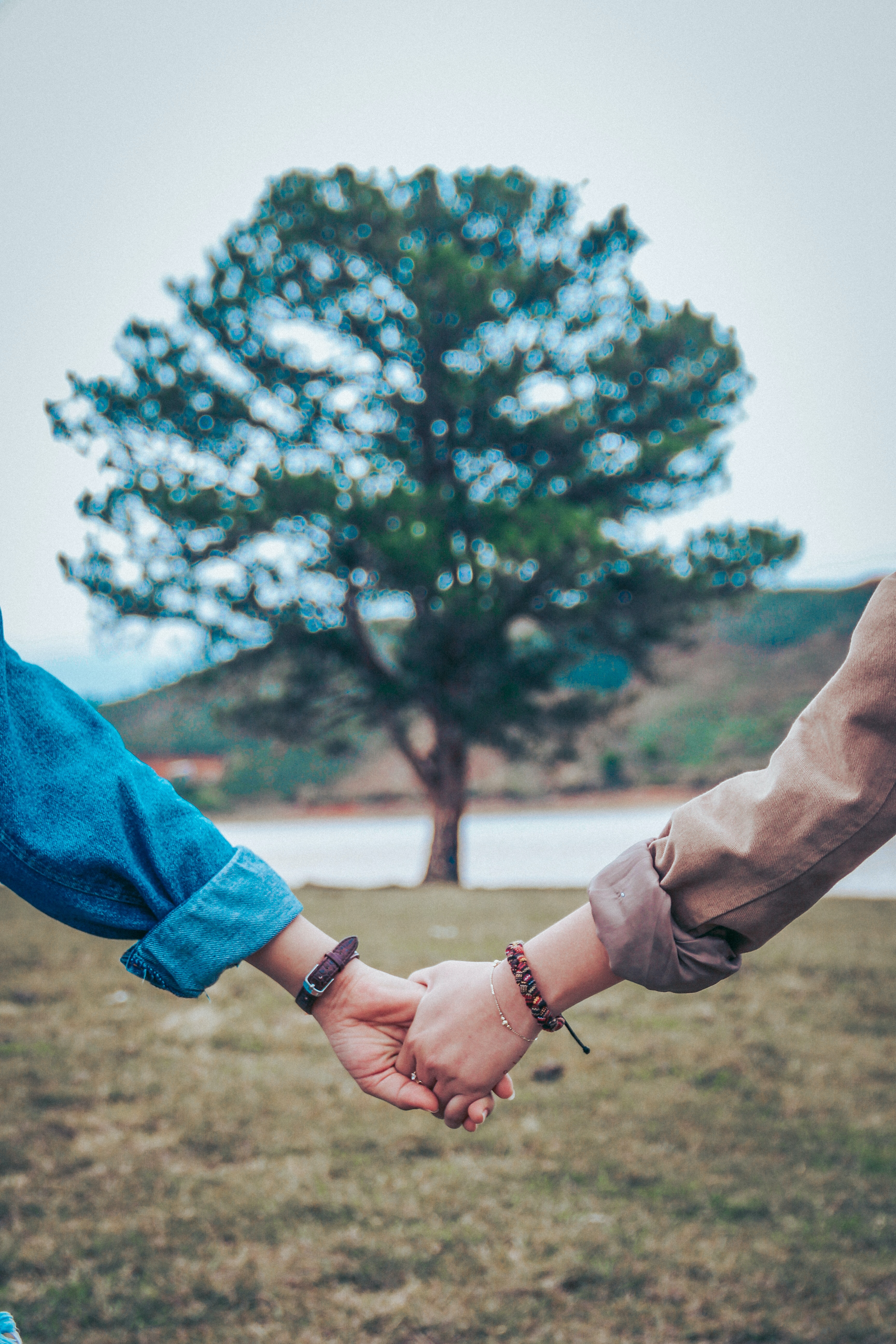 A photo of two people holding hands | Source: Unsplash