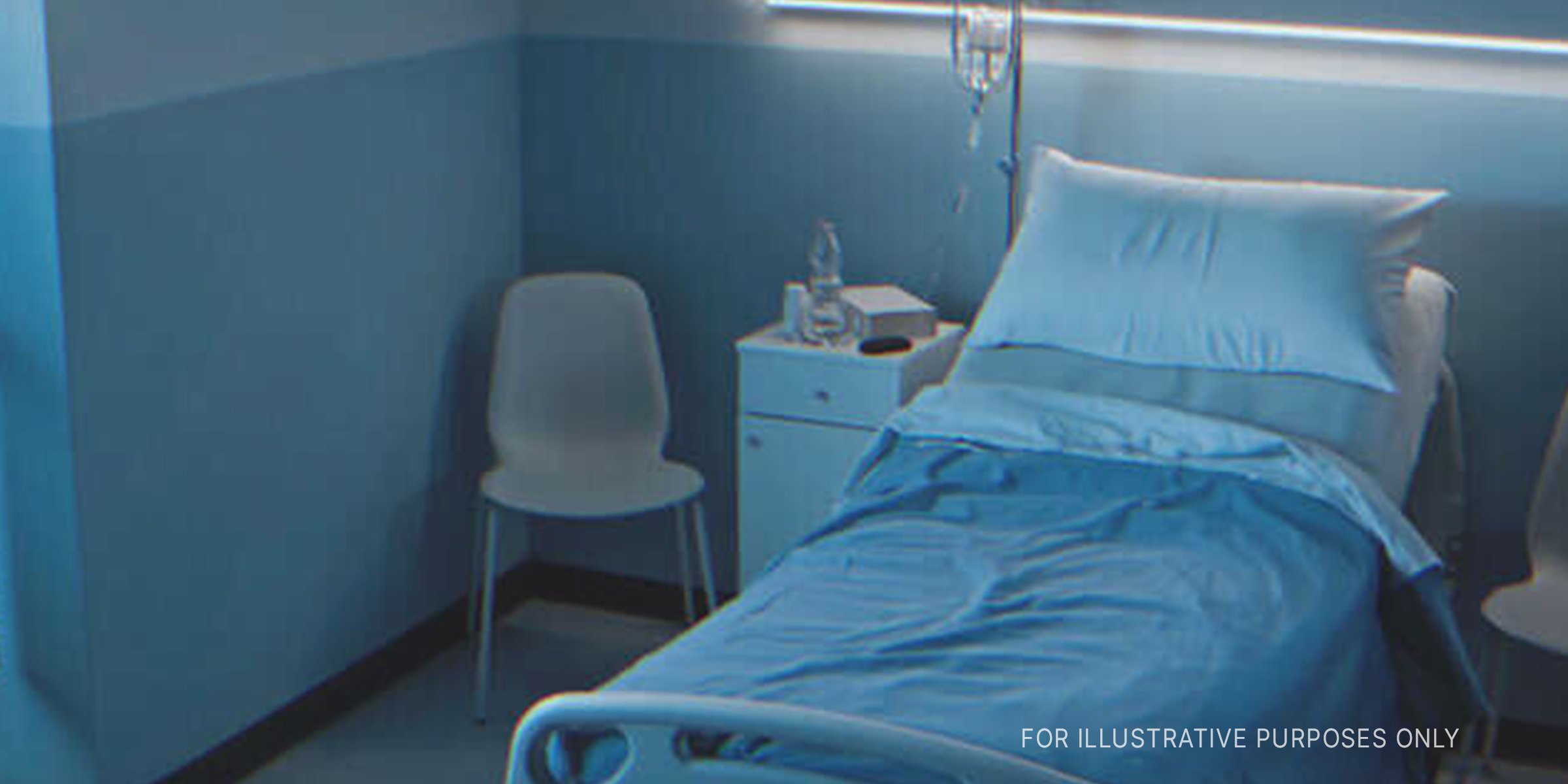 An empty hospital bed at night | Shutterstock