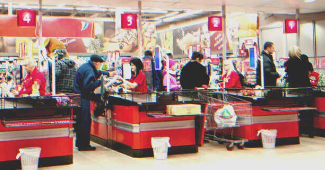 Several supermarket cashier lines | Source: Shutterstock