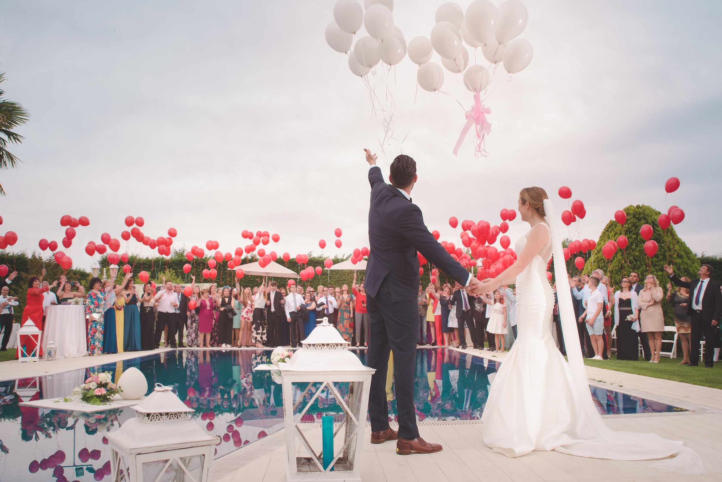 Balloons being released at a wedding. | Source: Unsplash