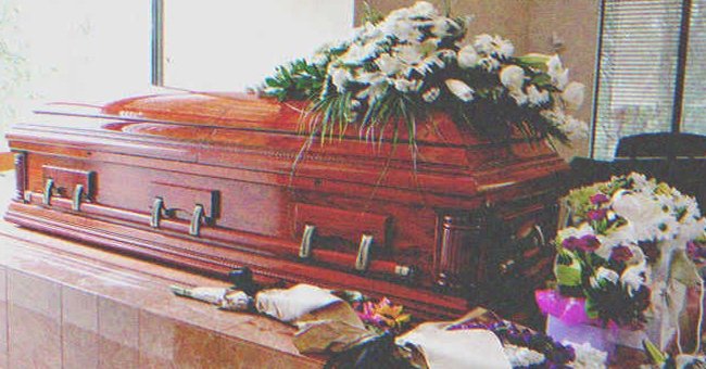 Flowers on top of a coffin | Source: Getty Images