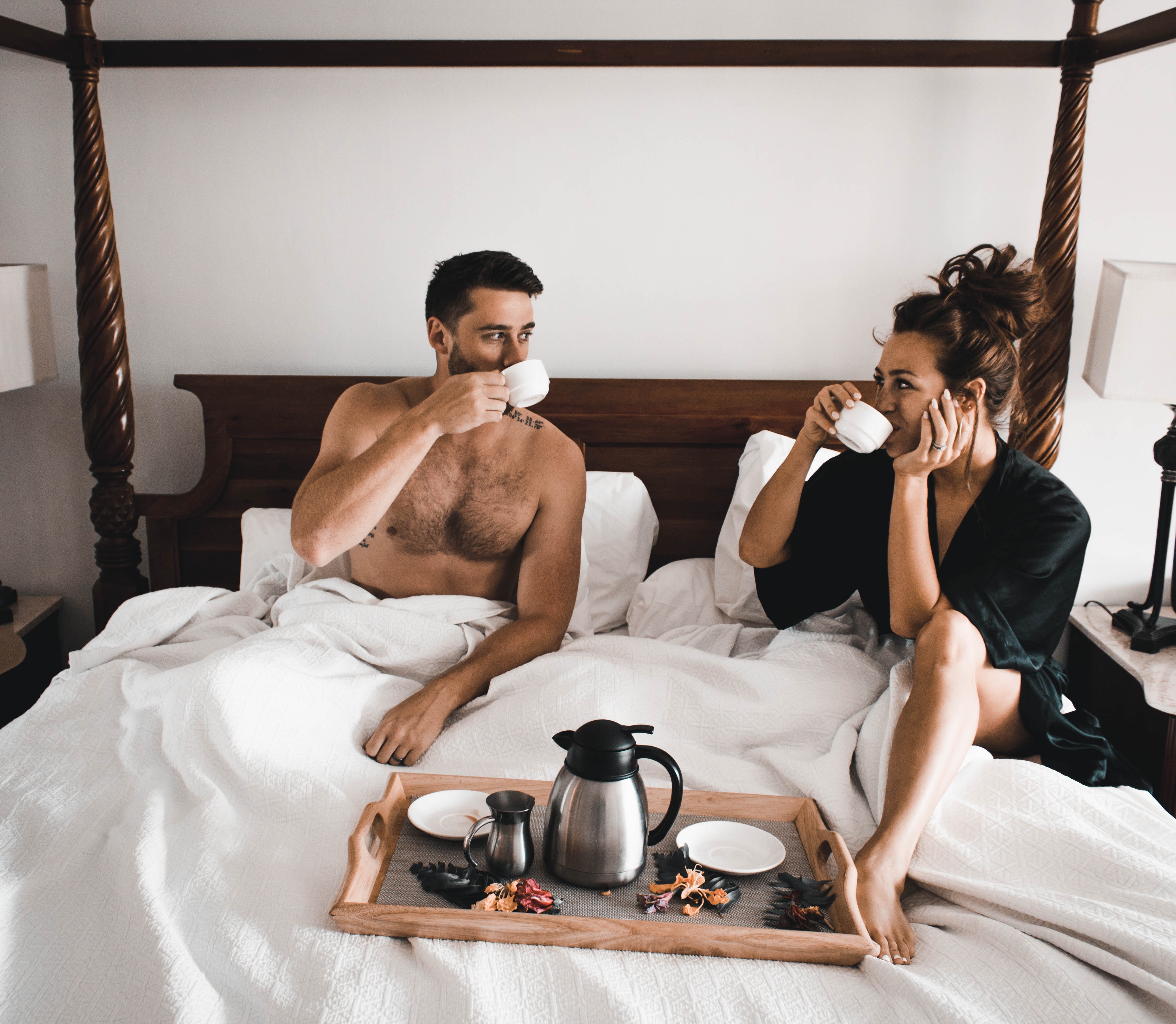 Romantic couple in bed | Source: Unsplash
