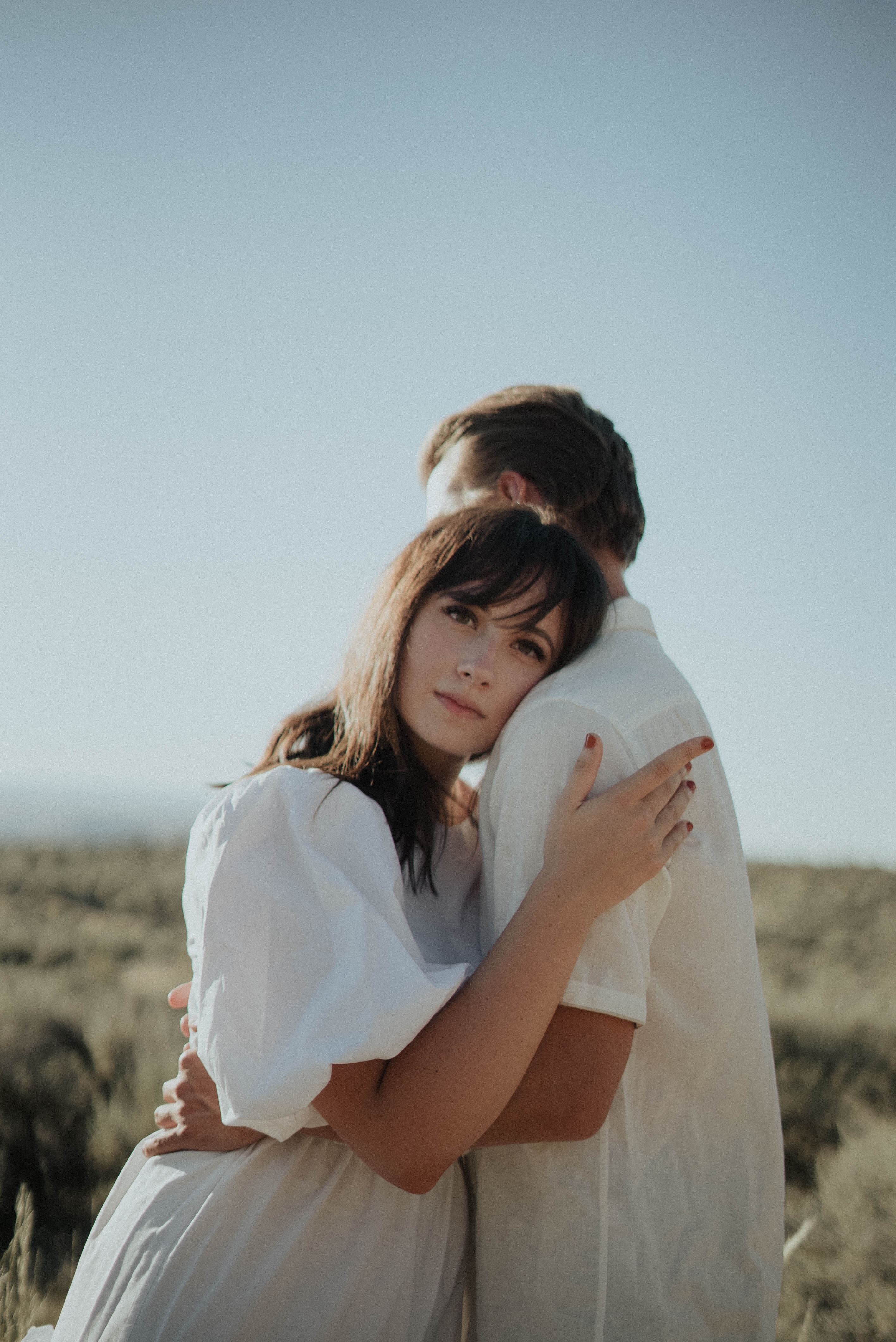 A woman and man hugging. | Source: Pexels