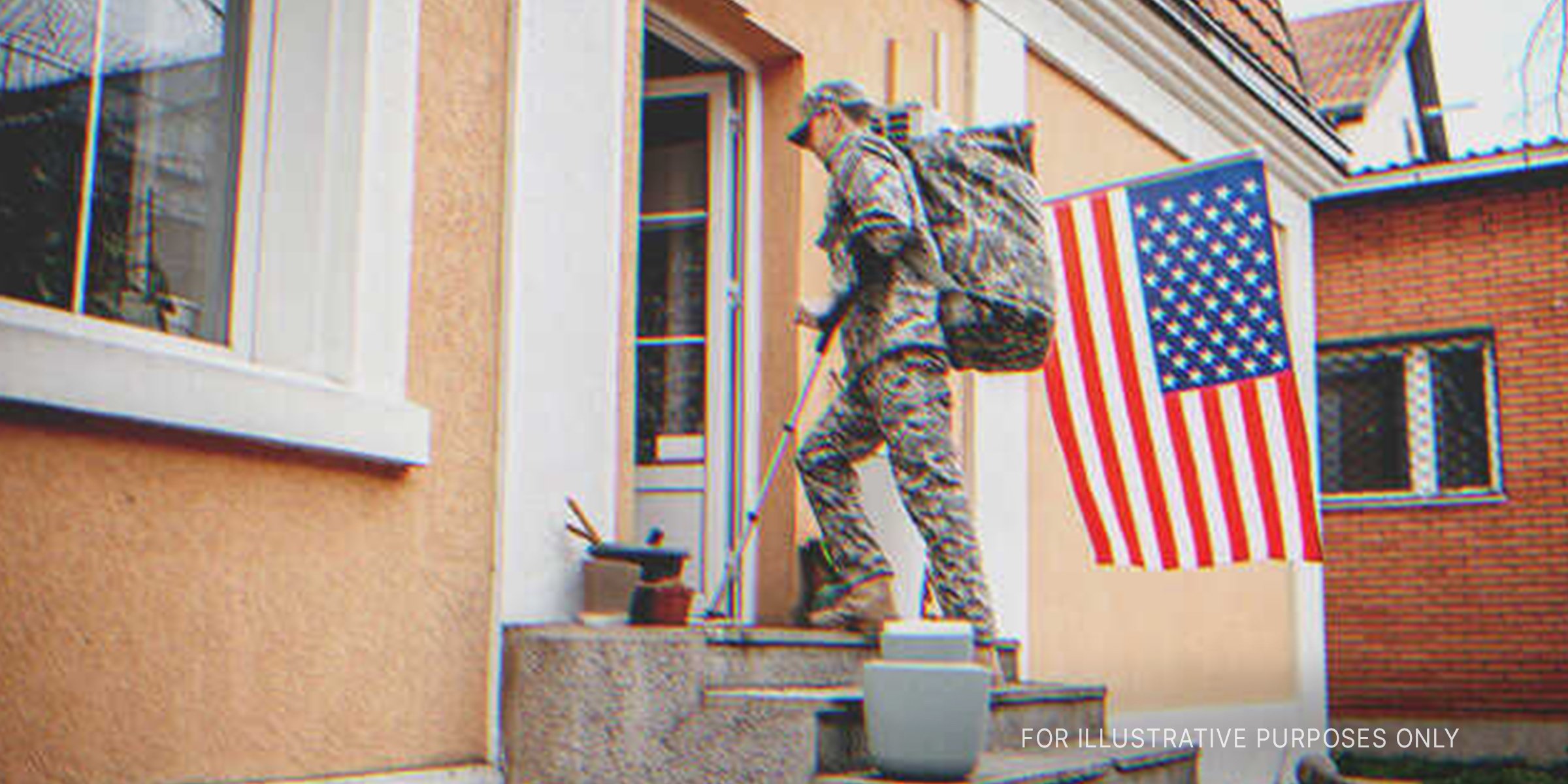 Injured Soldier Entering A House. | Source: Getty Images