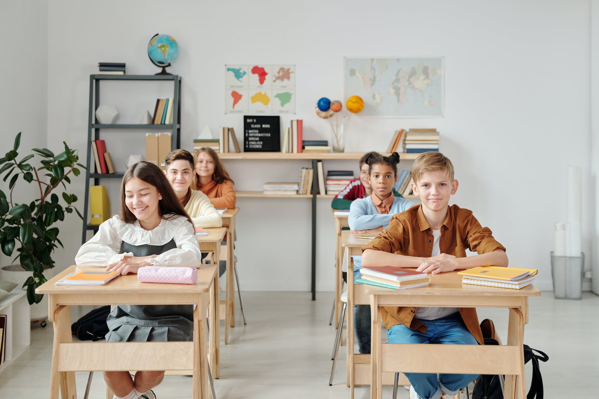 Children sitting in a classroom | Source: Pexels