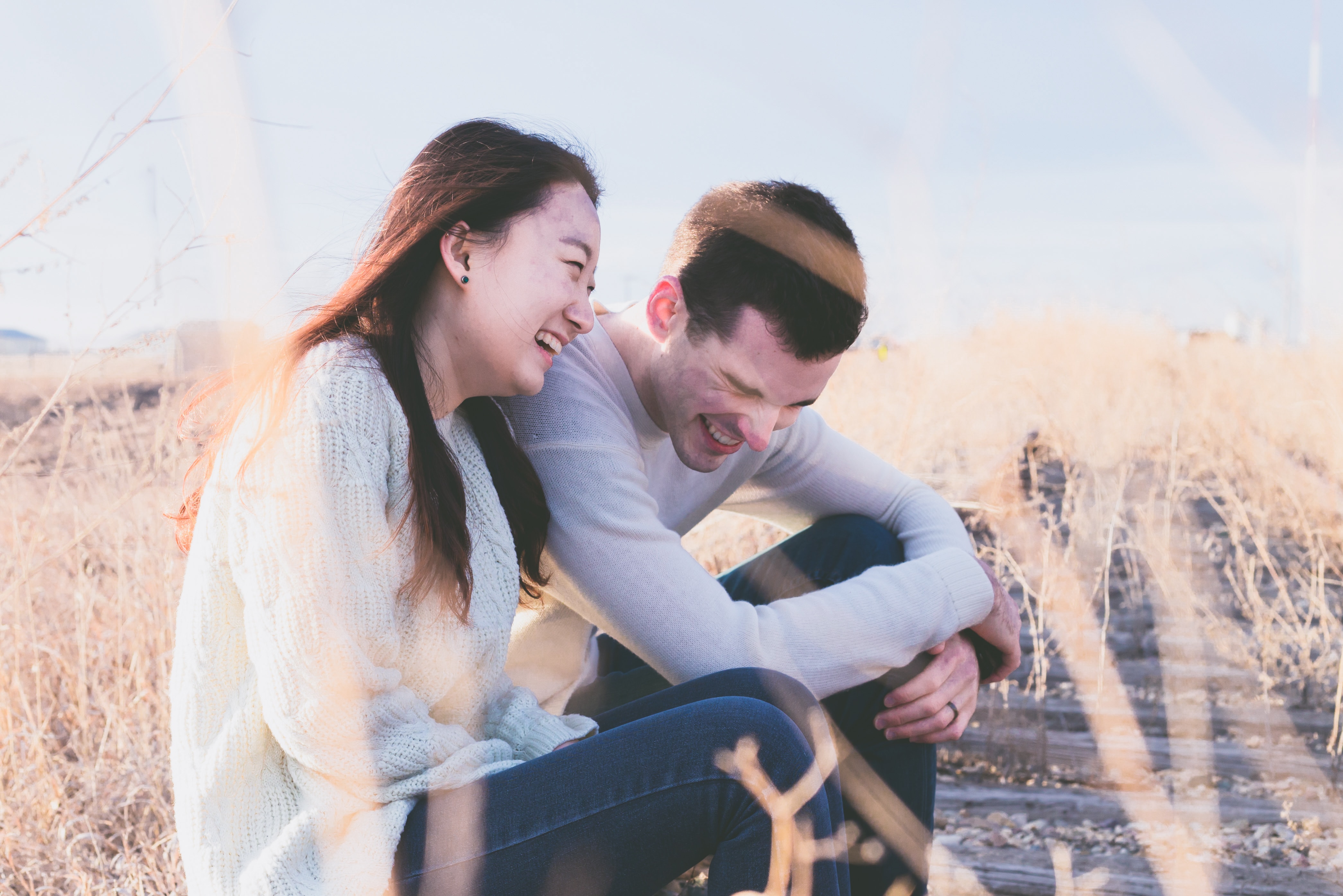 Couple sharing a hearty laugh | Source: Unsplash