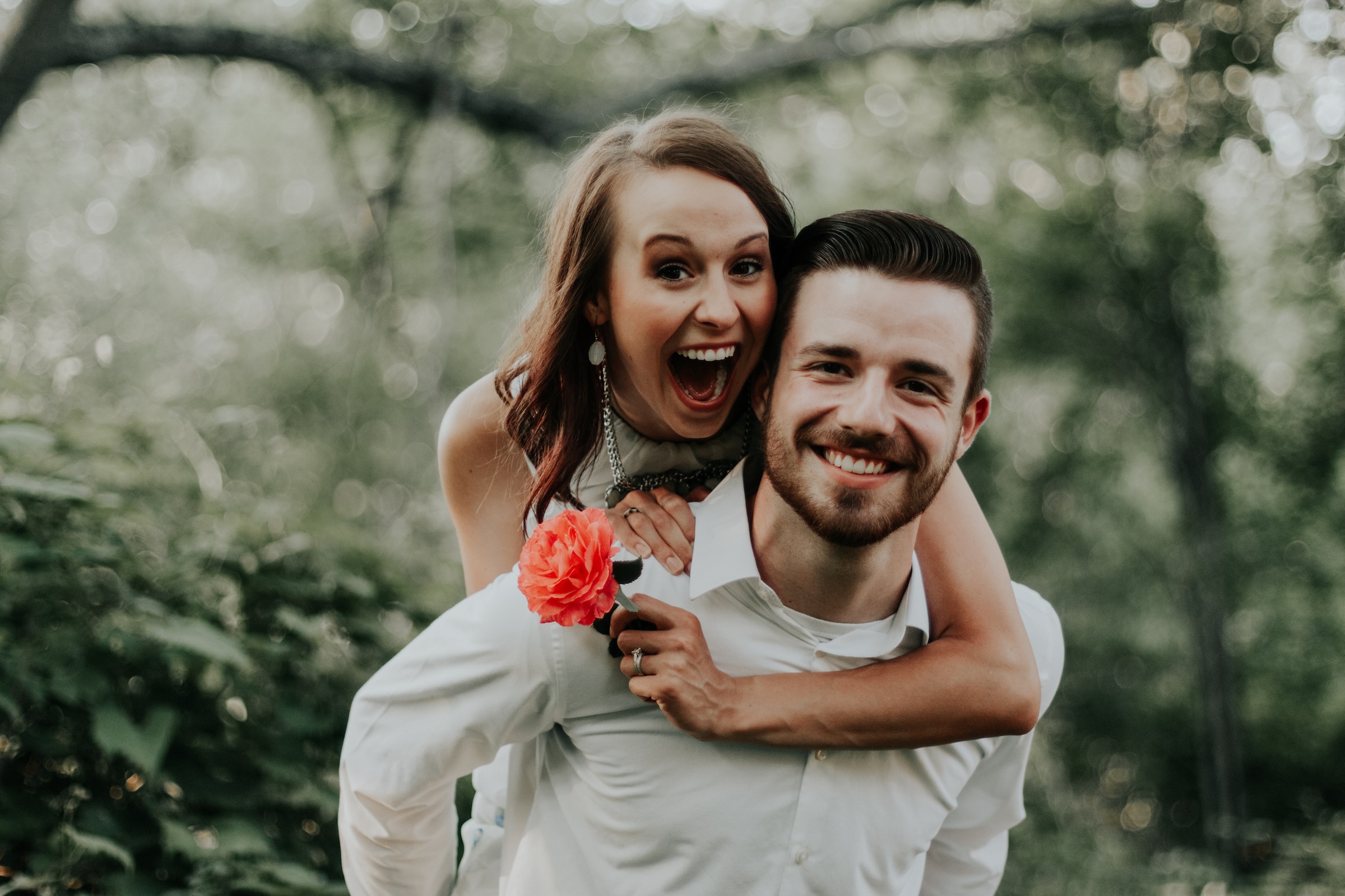 Couple smiling at the camera. | Source: Unsplash