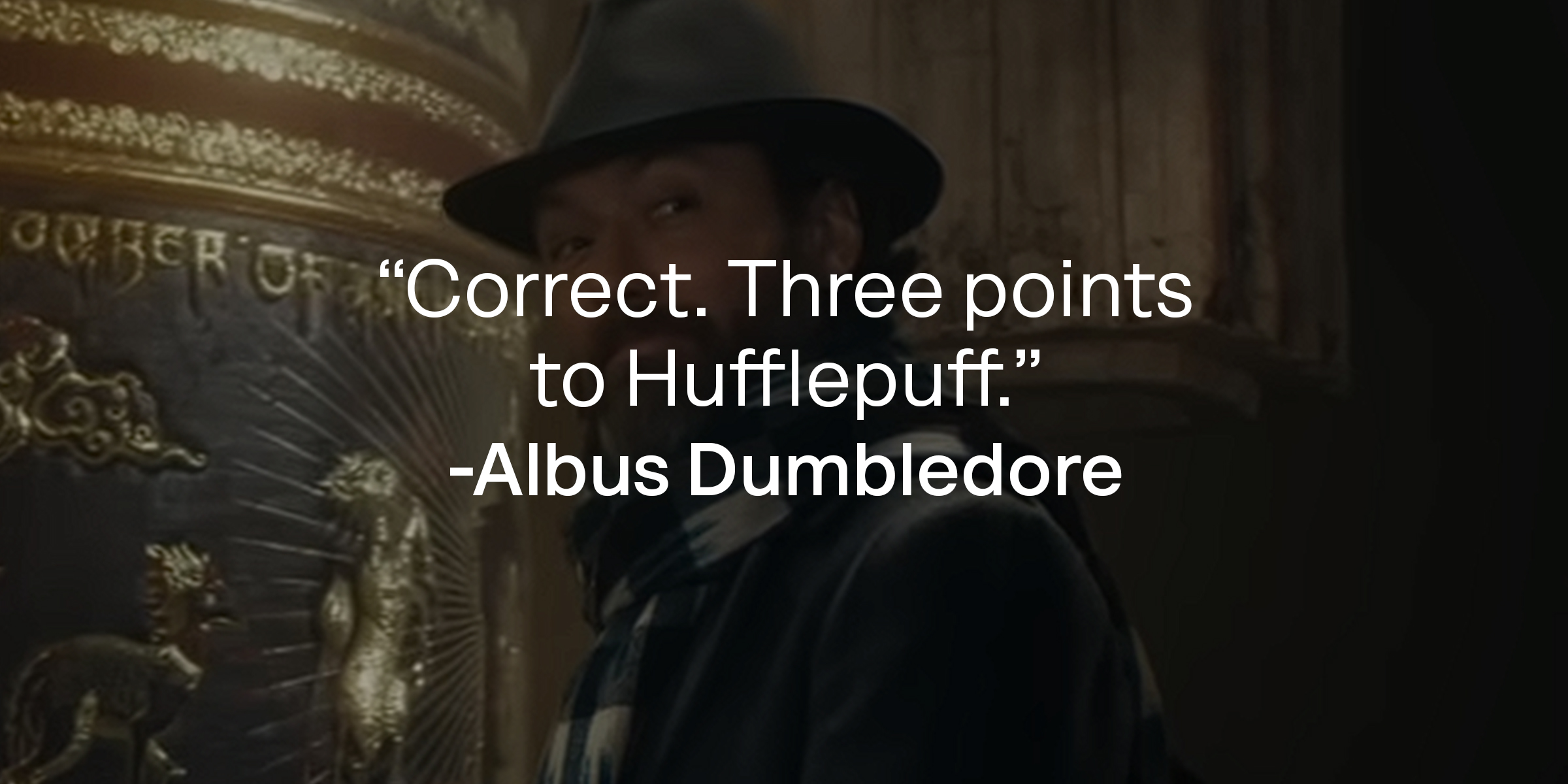 Albus Dumbledore, with his quote: "Correct. Three points to Hufflepuff." | Source: Youtube.com/WarnerBrosPictures