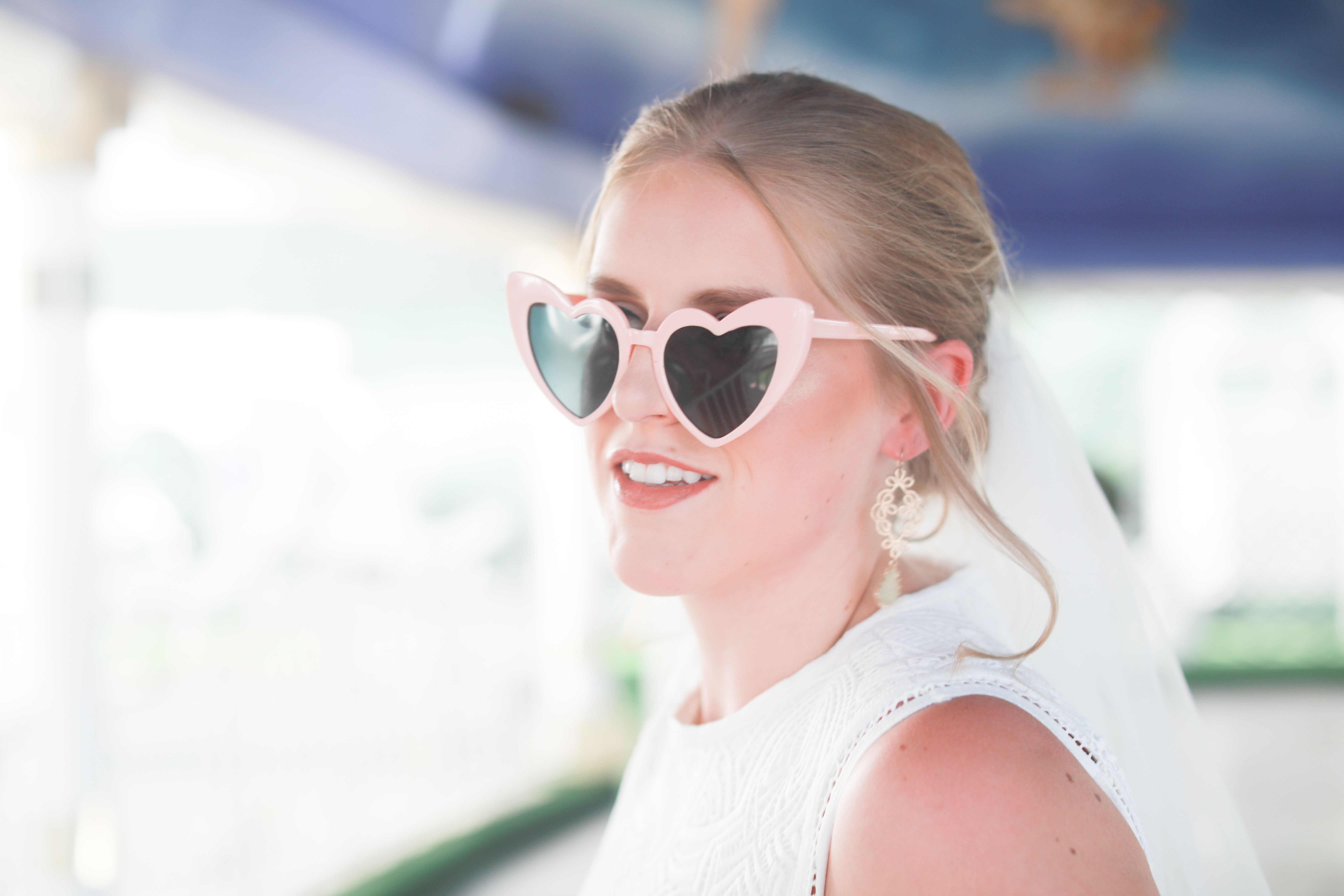 A bride with heart-shaped glasses on. | Source: Unsplash